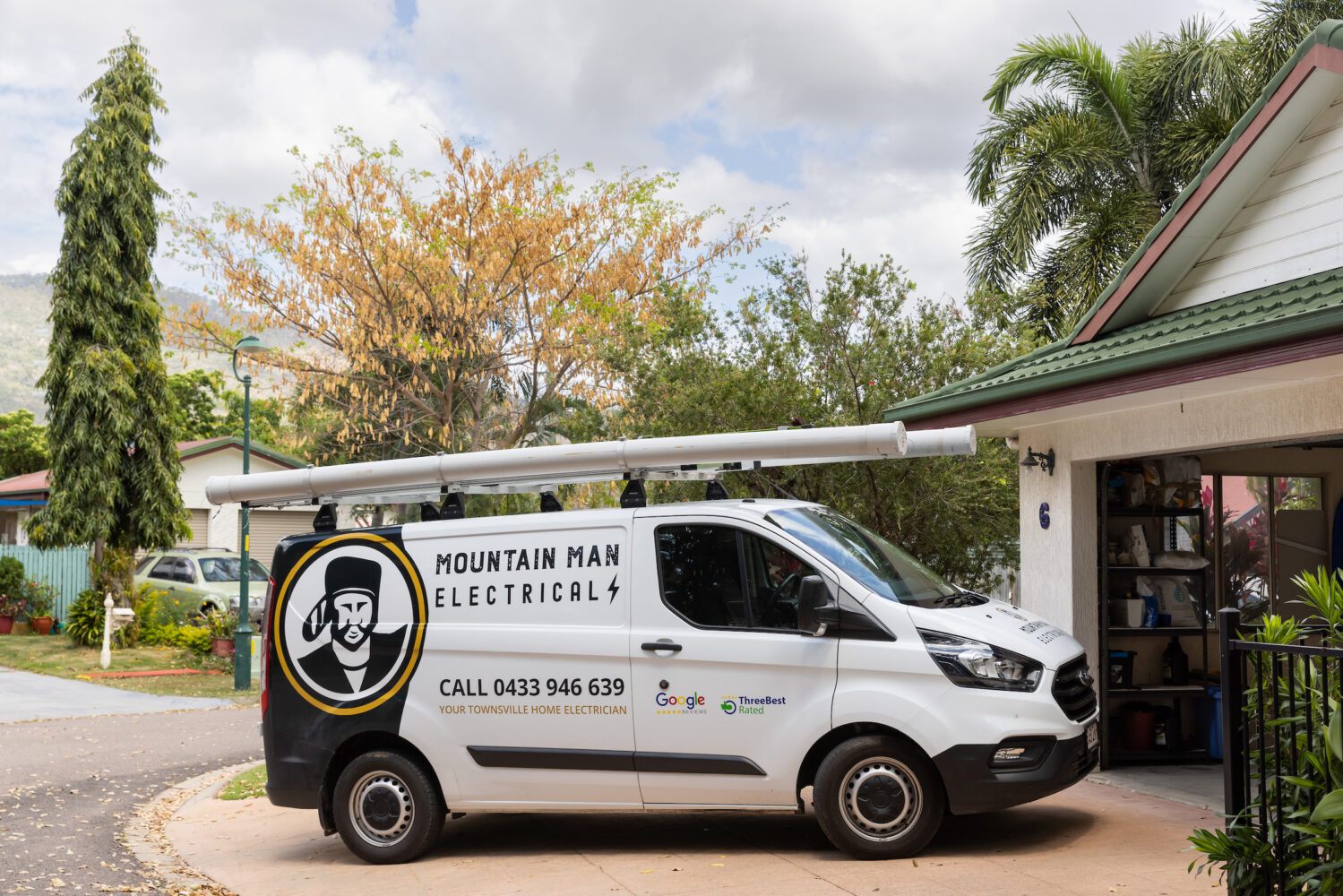 Our Mountain Man Electrical vans are easily recognisable in local Townsville suburbs